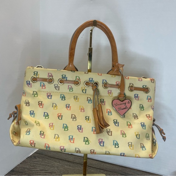 Dooney & Bourke Cream Satchel Bag pre-owned. Strap has stain. - Picture 1 of 16